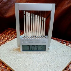 Wind chime alarm clock
